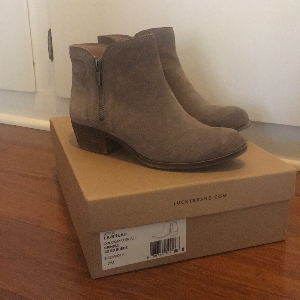 Lucky Brand suede booties with dual zippers.